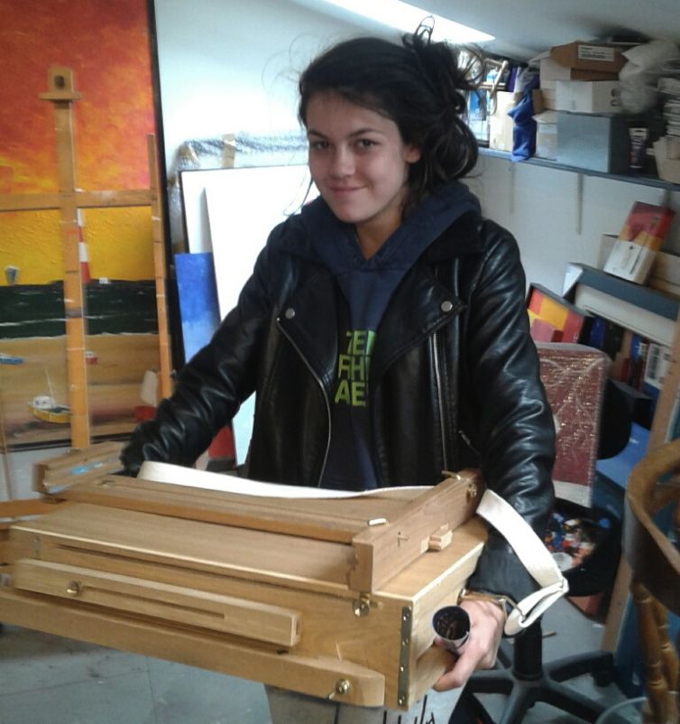 Hannah leaving with art materials